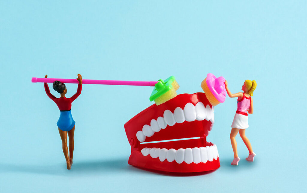 Brushing your teeth is important illustrated with plastic models