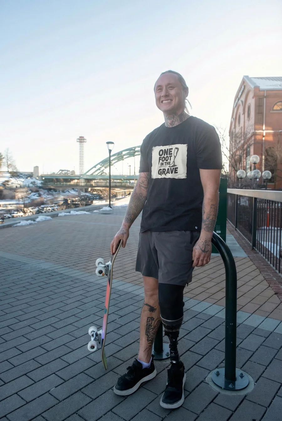 One Foot in the Grave tee close-up on skater